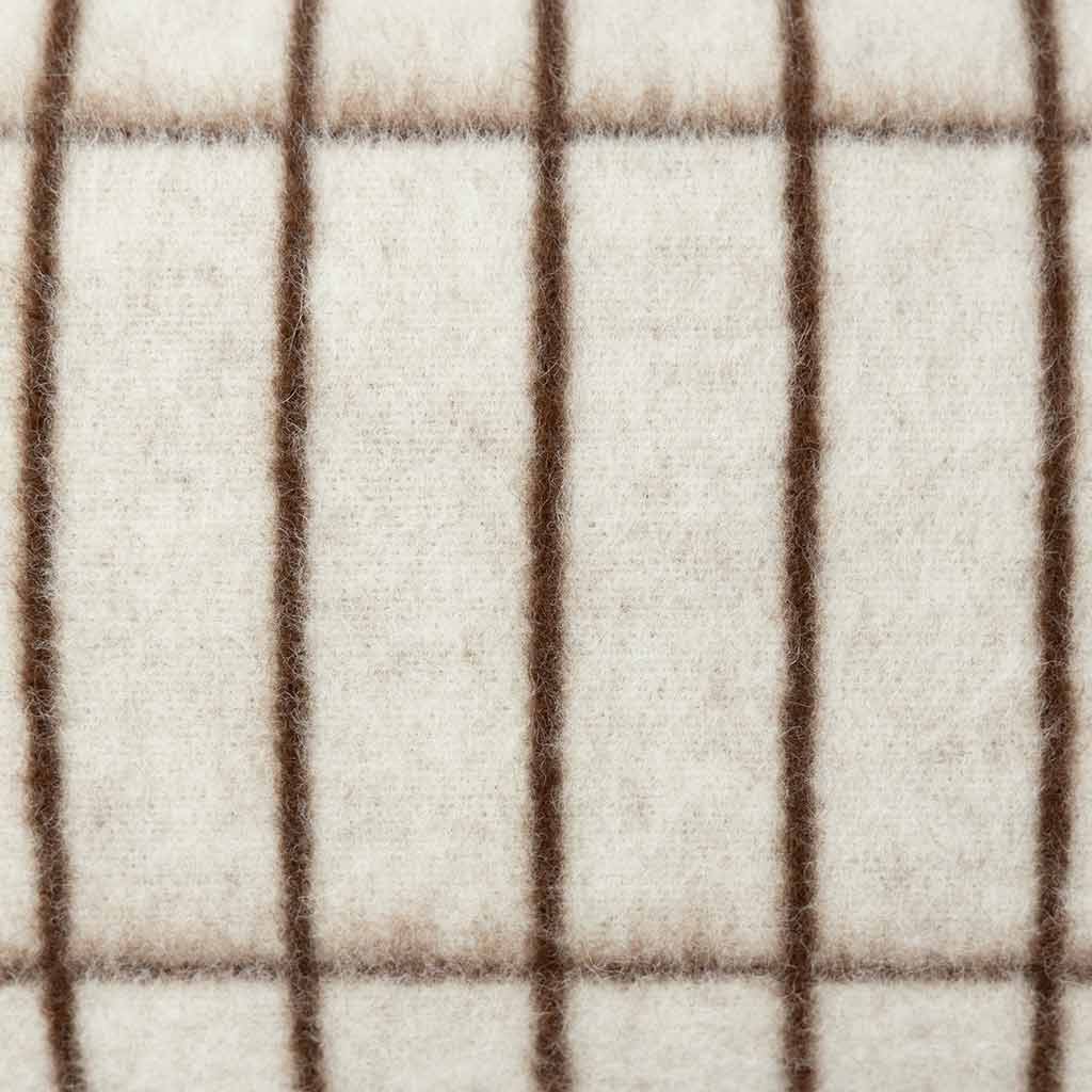 Aalto pillow surface showing naturally occurring sepia tone in fleece