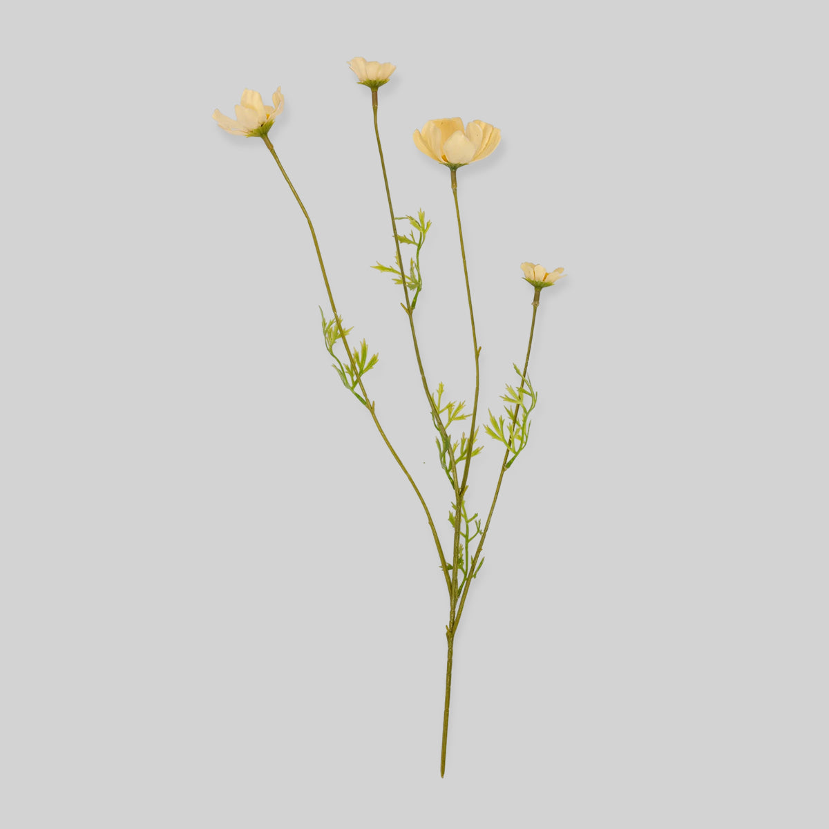Artificial cosmos flowers with butter-yellow petals and slender green foliage