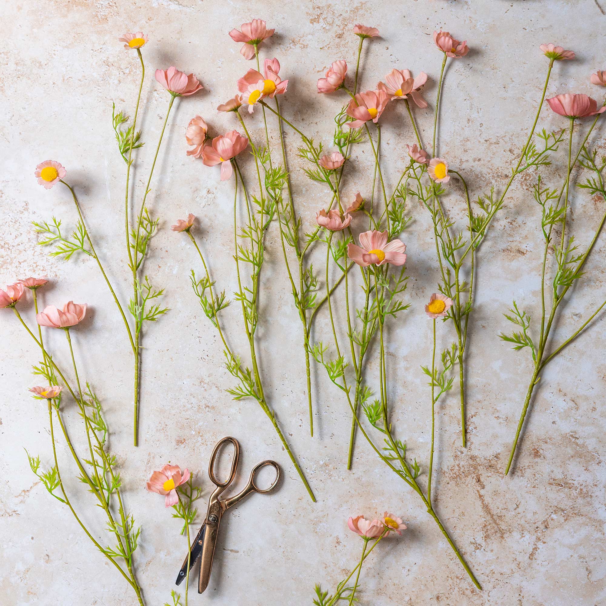 Faux cosmos meadow stems in soft pink with airy spacing