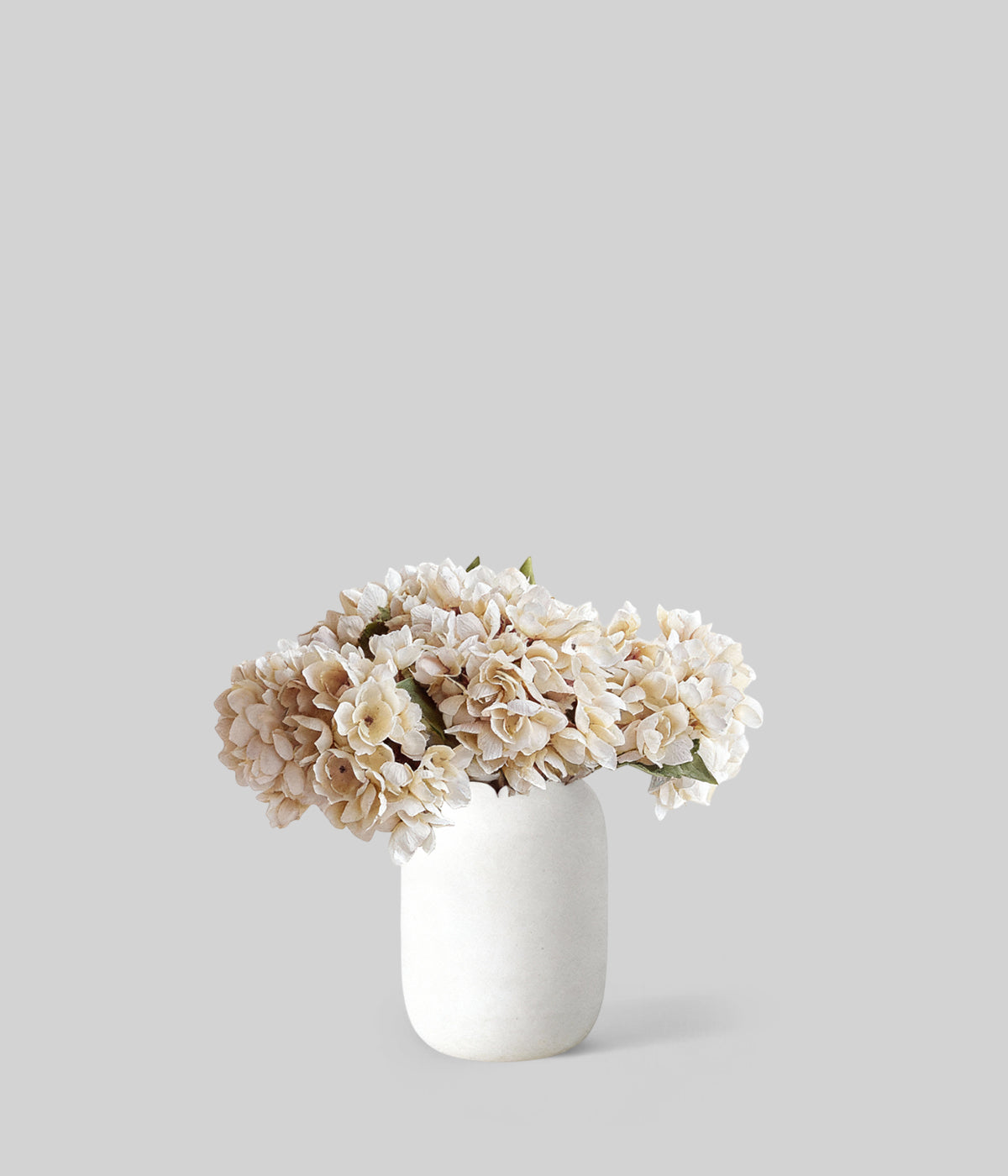 Champagne faux hydrangea bouquet offering sculptural presence in interiors