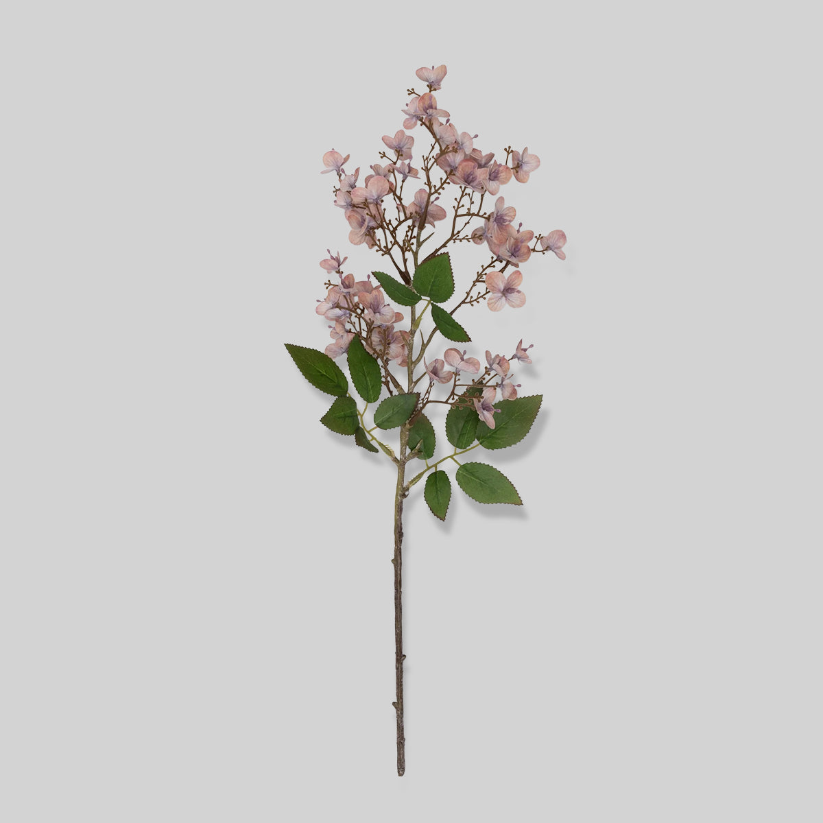 Artificial cherry blossom branch with blush pink flowers and airy clusters