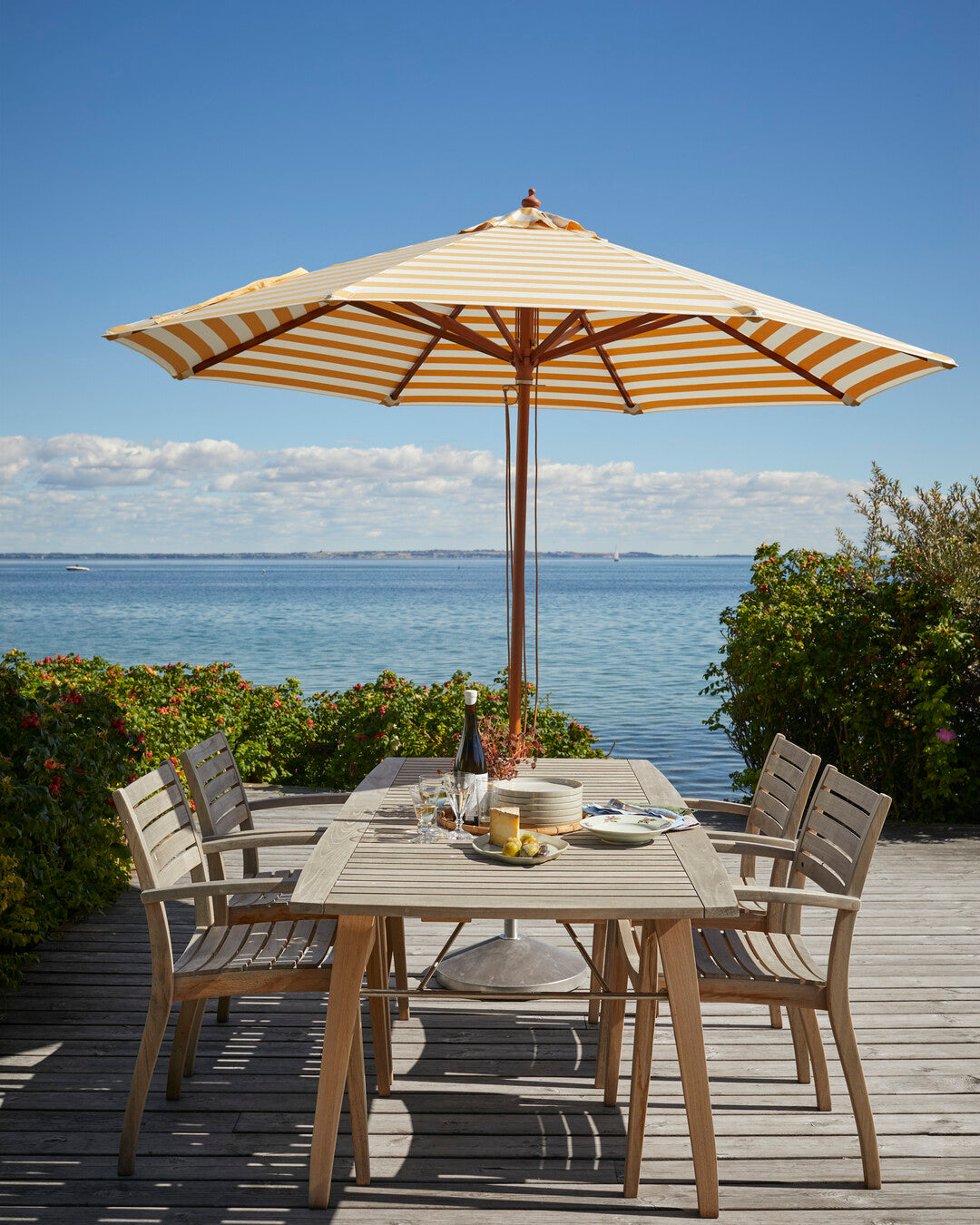 weather-resistant teak dining table
