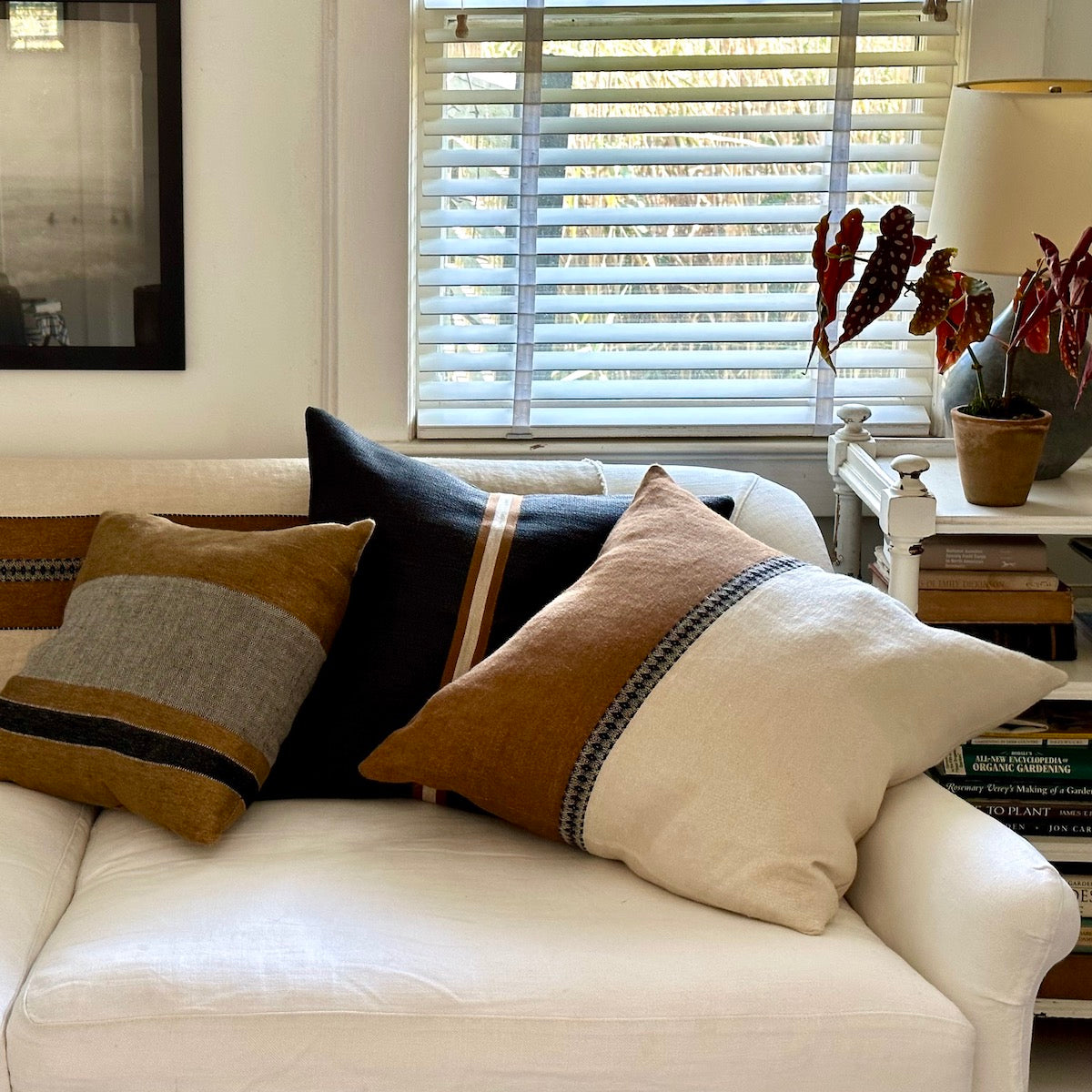 Washed linen pillow styled on chair for cozy neutral living spaces