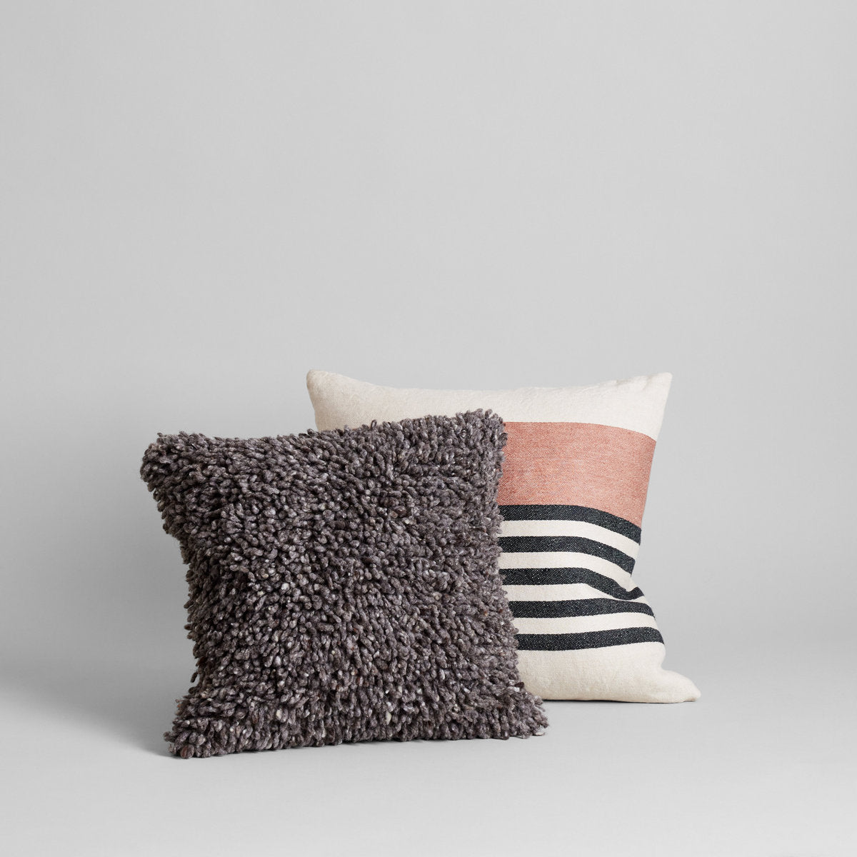 Inyo pillow cover in pre-washed linen with bold stripes for minimalist interiors