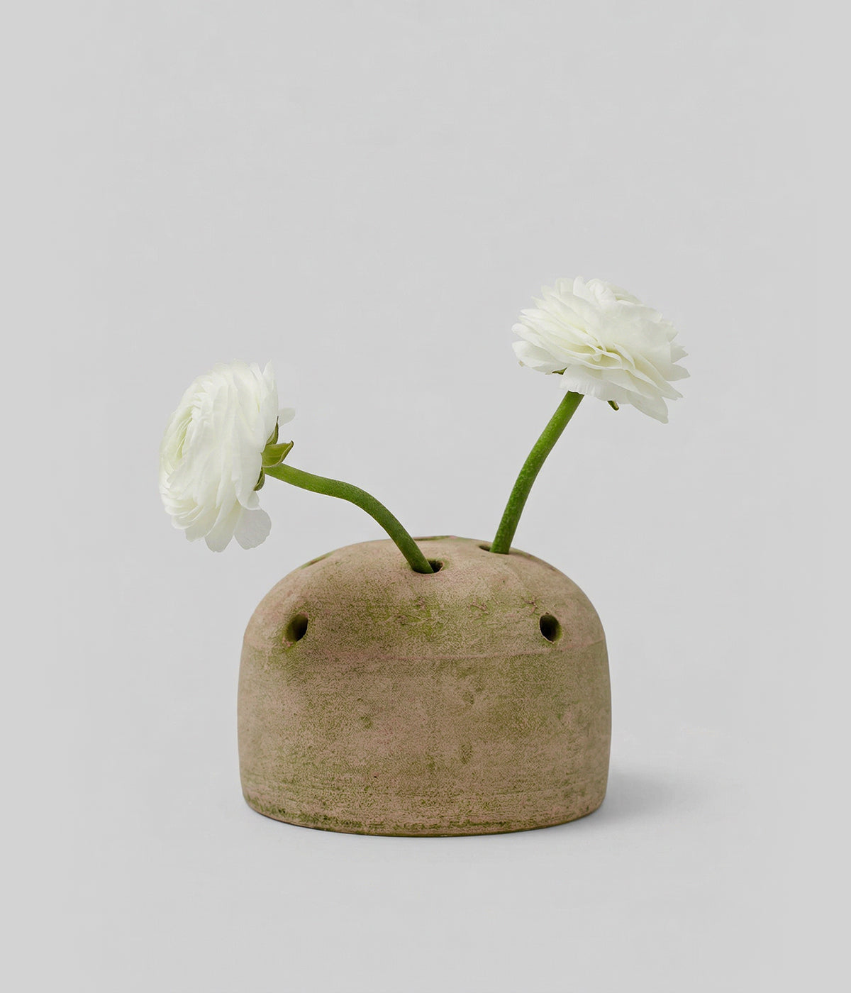 Greenwash terra cotta frog vase with mossy patina and stem-holding holes