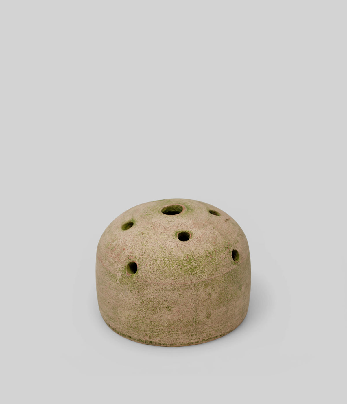 Green patina terra cotta vase with perforated top for floral arranging