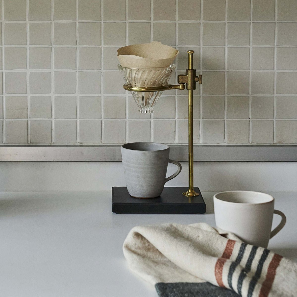 Hand-thrown pottery mug in neutral glaze finish