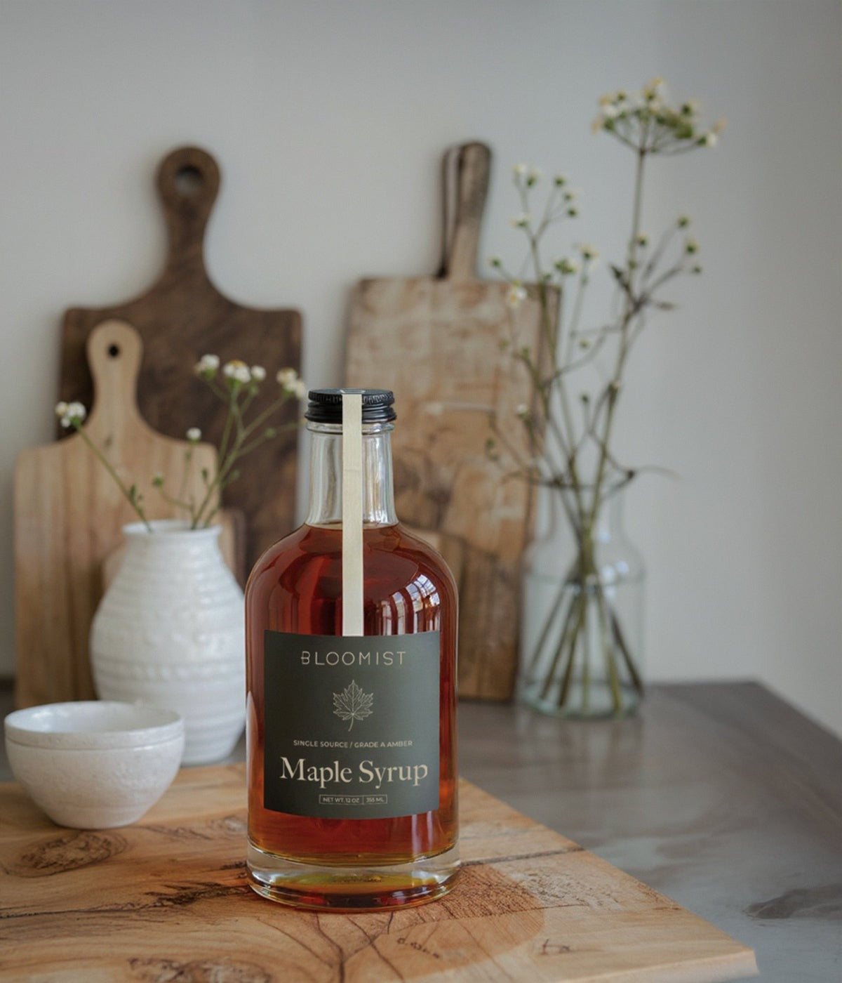 Handcrafted amber maple syrup from local producers with rich golden color