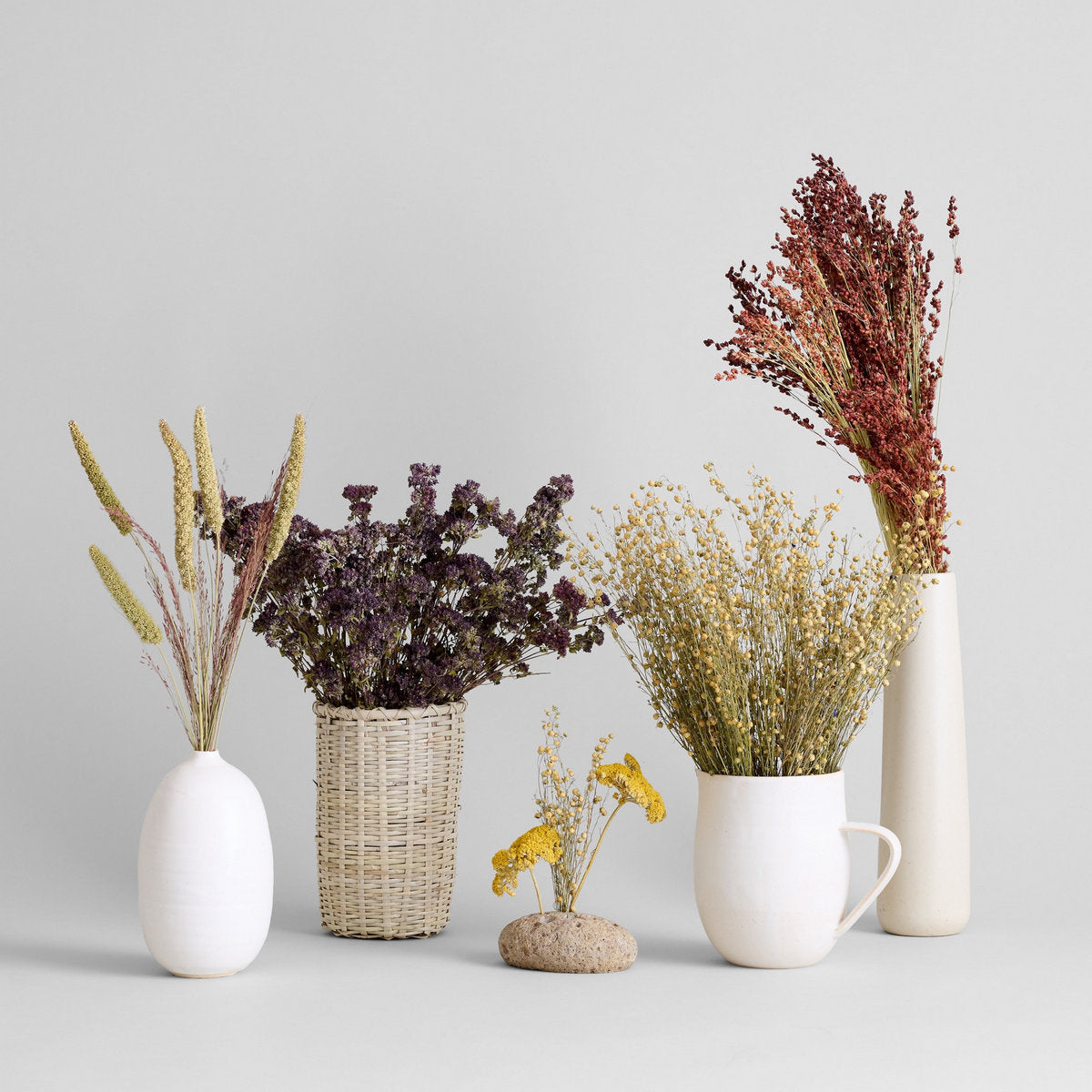 white pottery pitcher vase with smooth glazed finish and balanced proportions