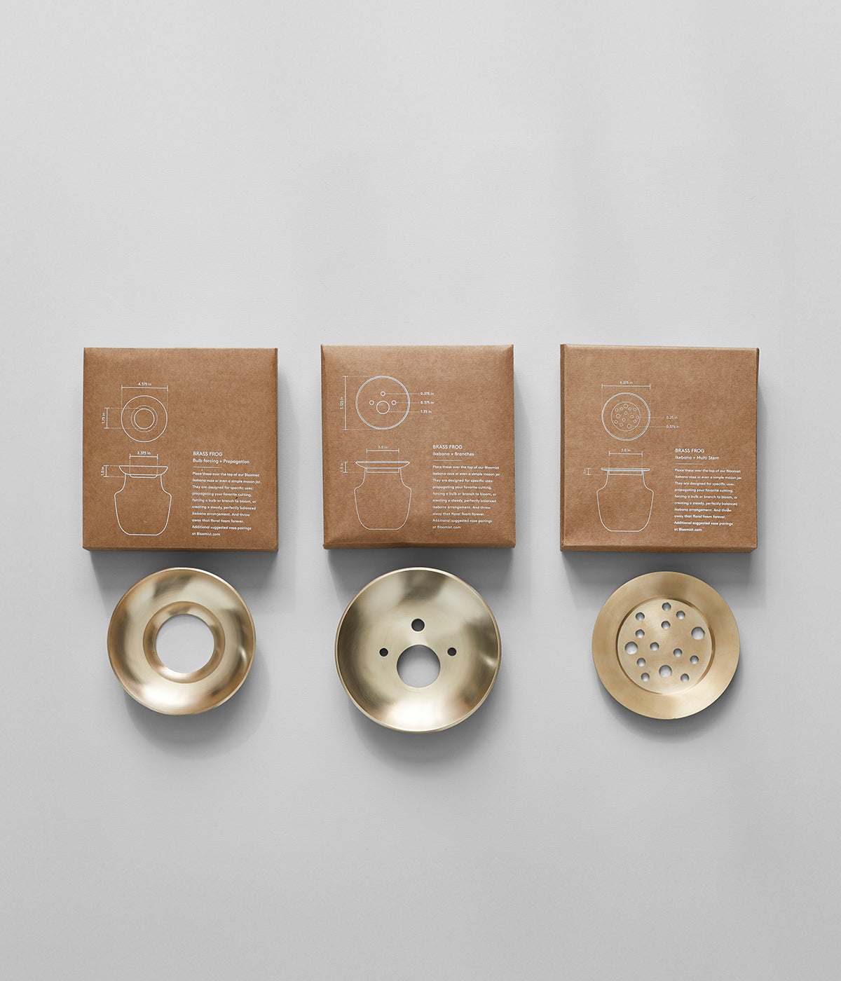 Ceramic Ikebana vases from Bloomist with weighted brass frogs for flower compositions