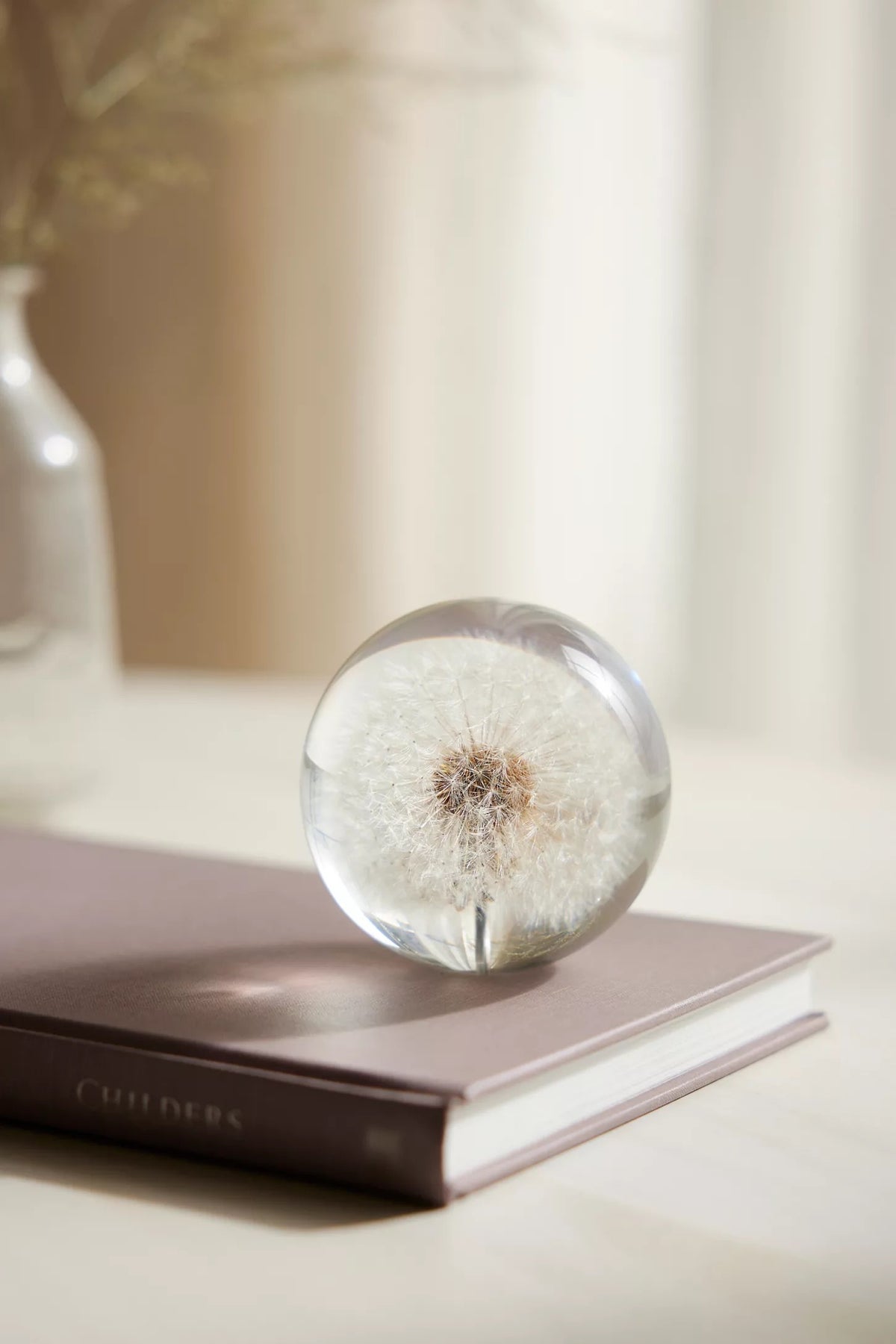 Hand-polished paperweight dandelion cast in clear polyester resin