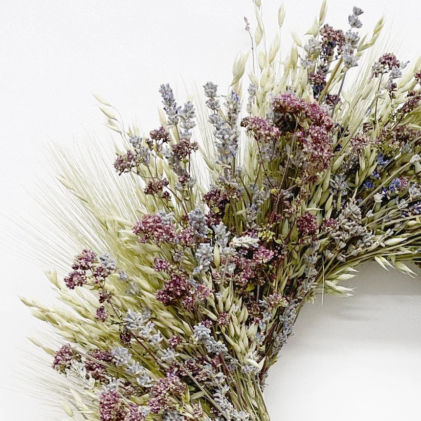 Detail view of Beatrice wreath showing herbal texture with lavender and wheat stems
