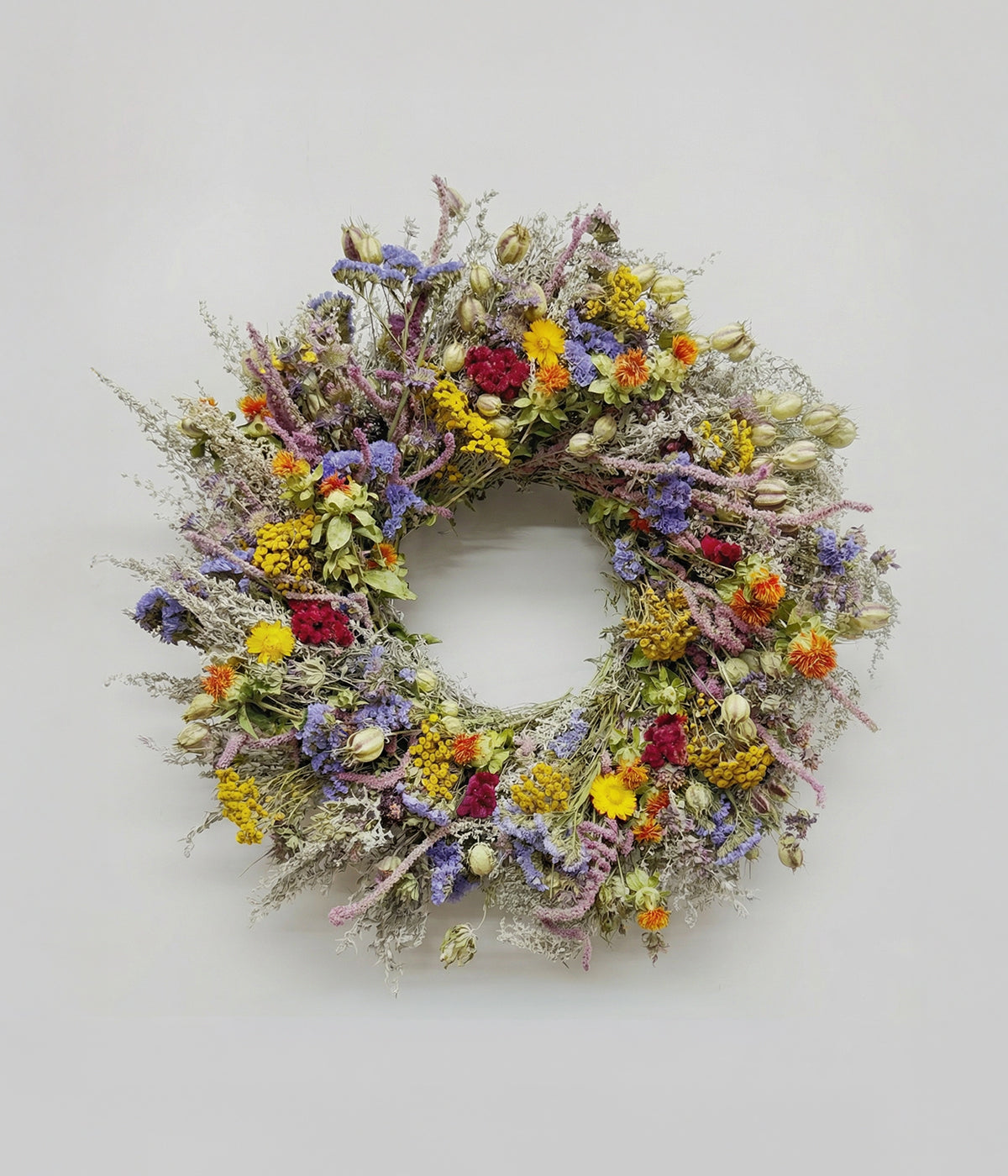 Estell dried colorful wreath with yellow tansy, orange safflower, purple statice, magenta celosia