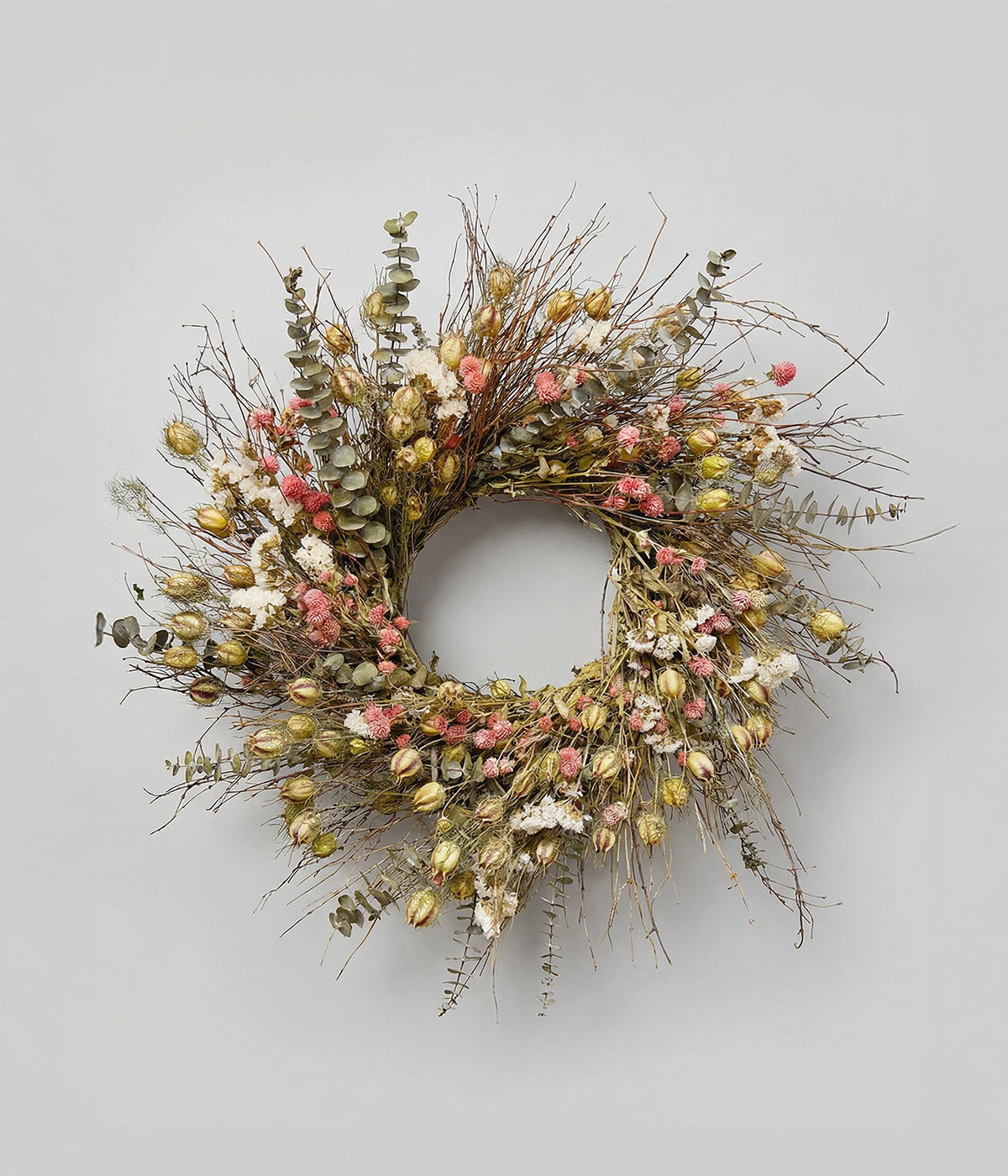 Isabelle dried eucalyptus wreath with twigs, silvery eucalyptus, pink amaranth, and white statice
