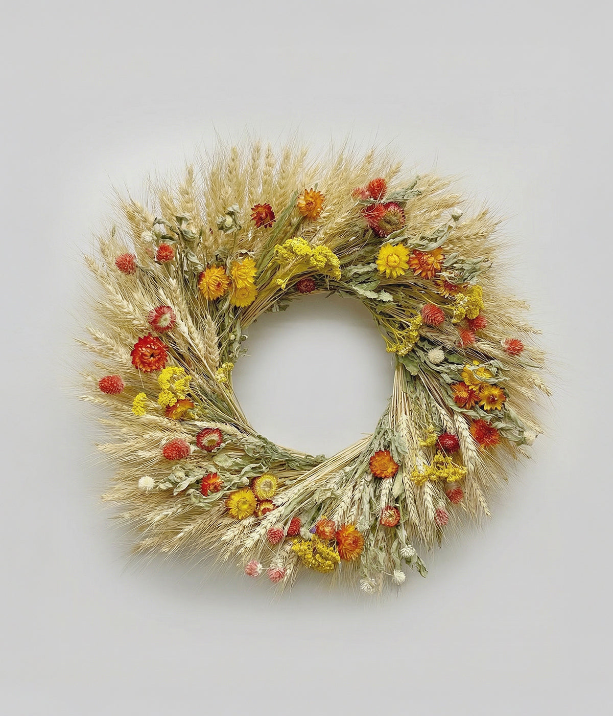 Louisa dried yellow spring wreath with golden wheat, yellow yarrow, and orange strawflowers