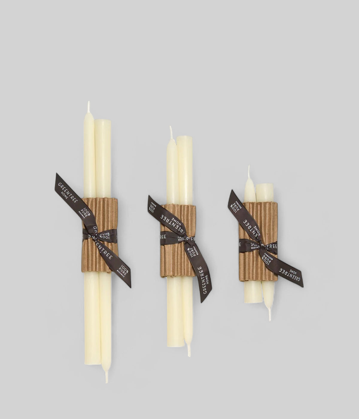Elegant gift setting with 10 inch white taper candles