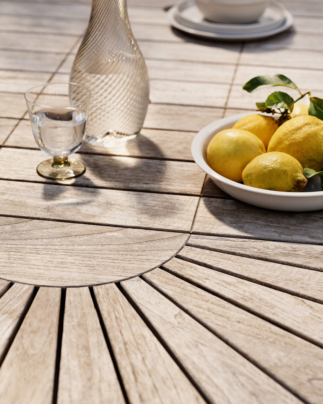 Contemporary teak patio table
