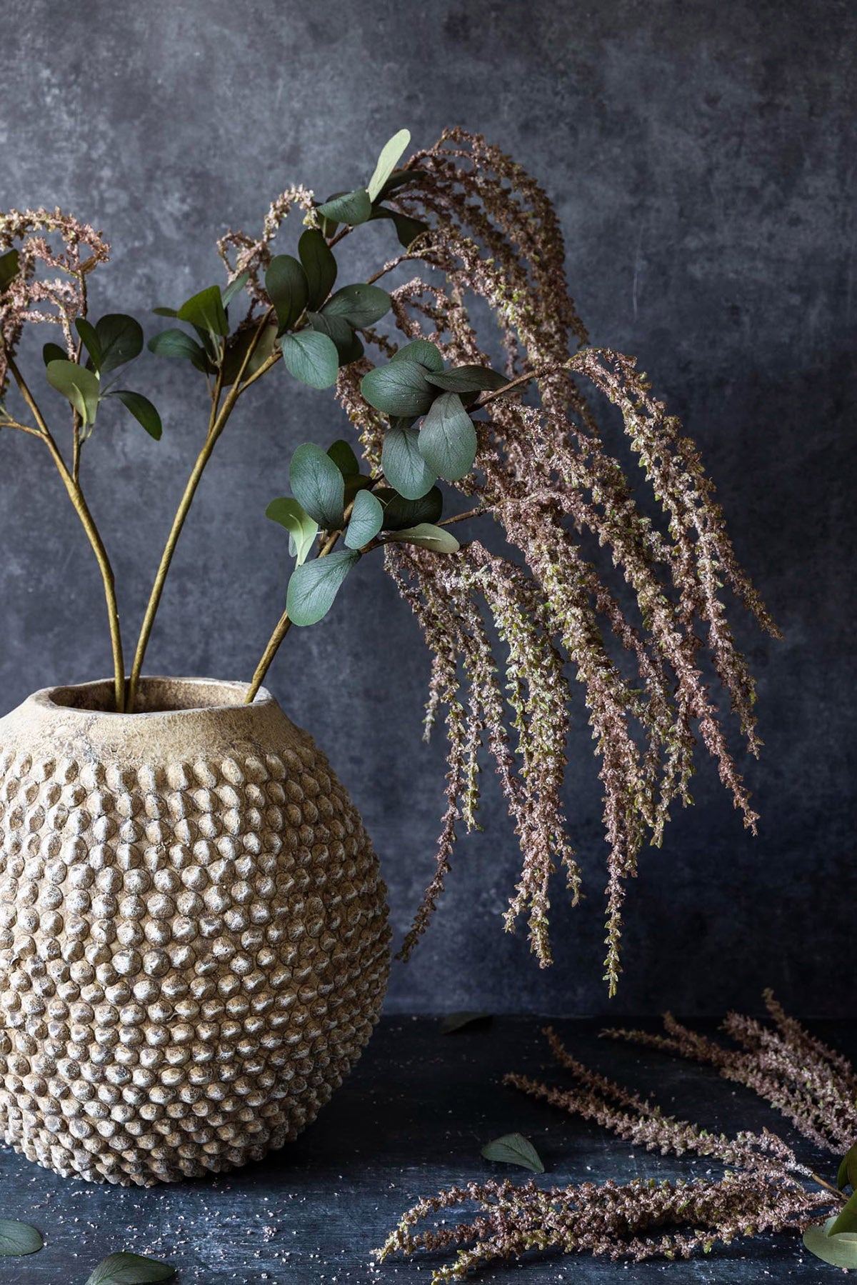Faux Amaranthus Stem in blush with trailing tassels styled in a tall vase