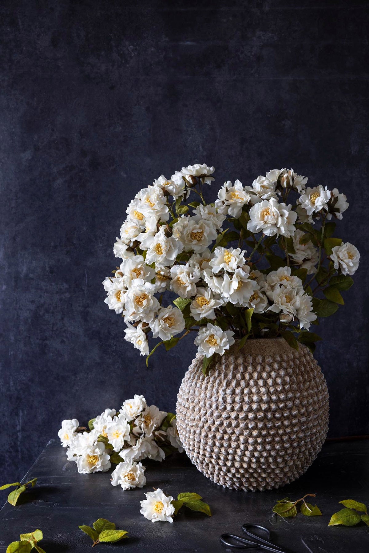 Realistic cream rose spray with bendable wire core for bouquets and floral displays