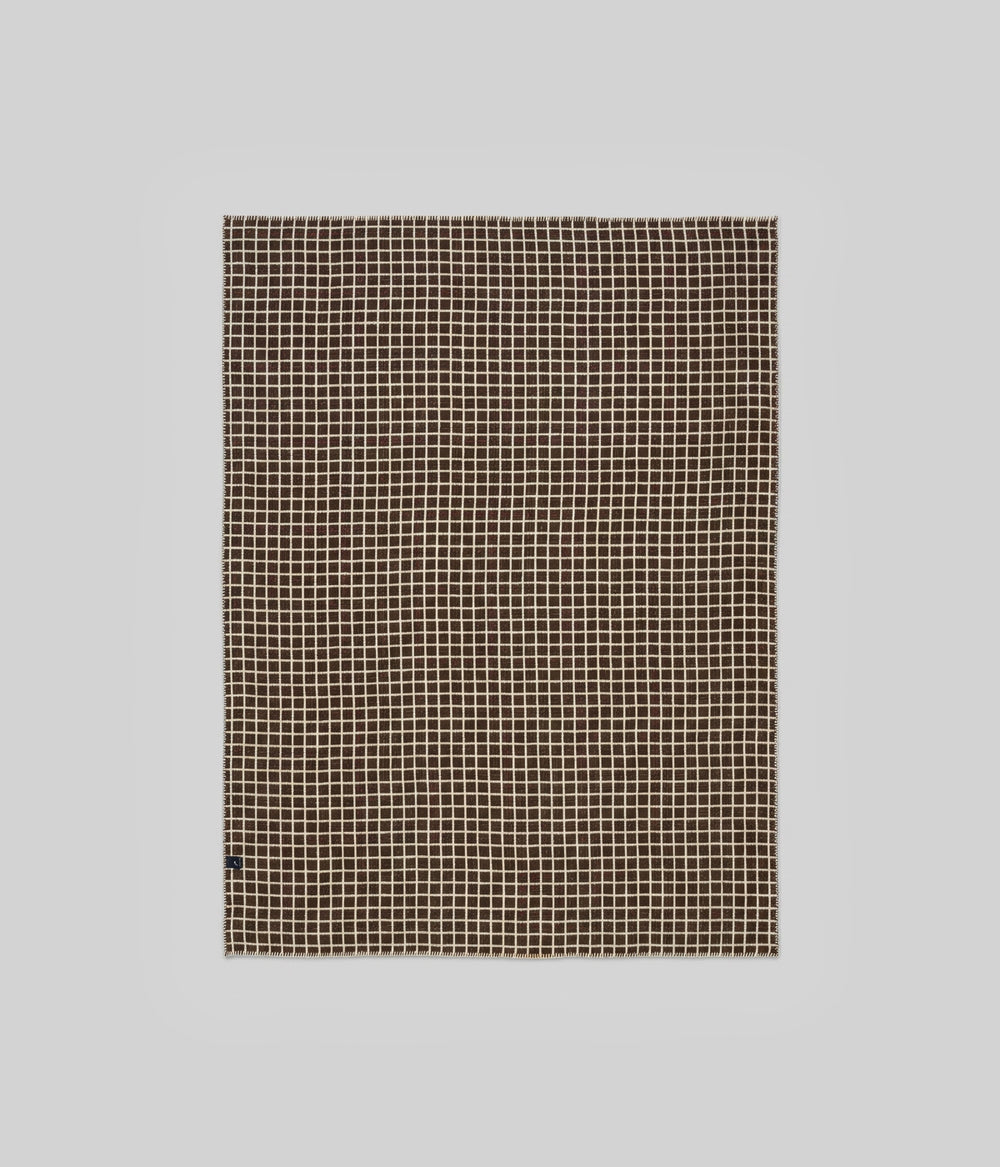 Floyd throw ivory face showing fine coffee grid lines across full field