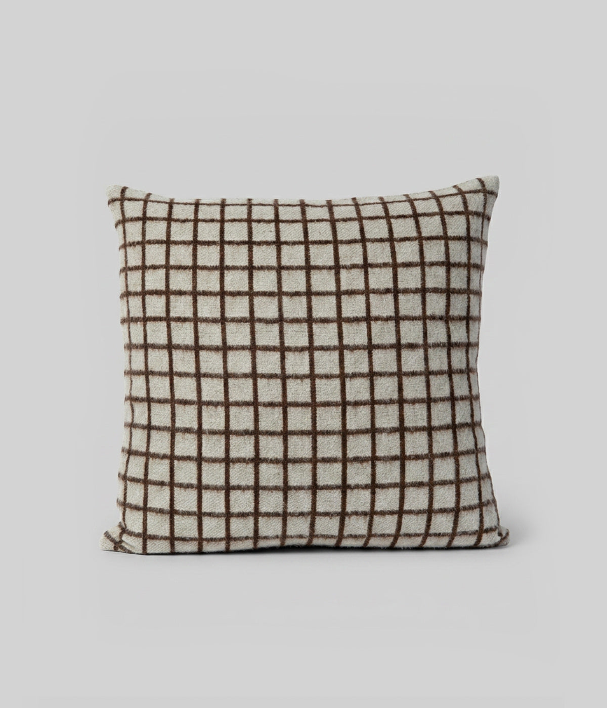 Floyd brown throw pillow woven in Peru