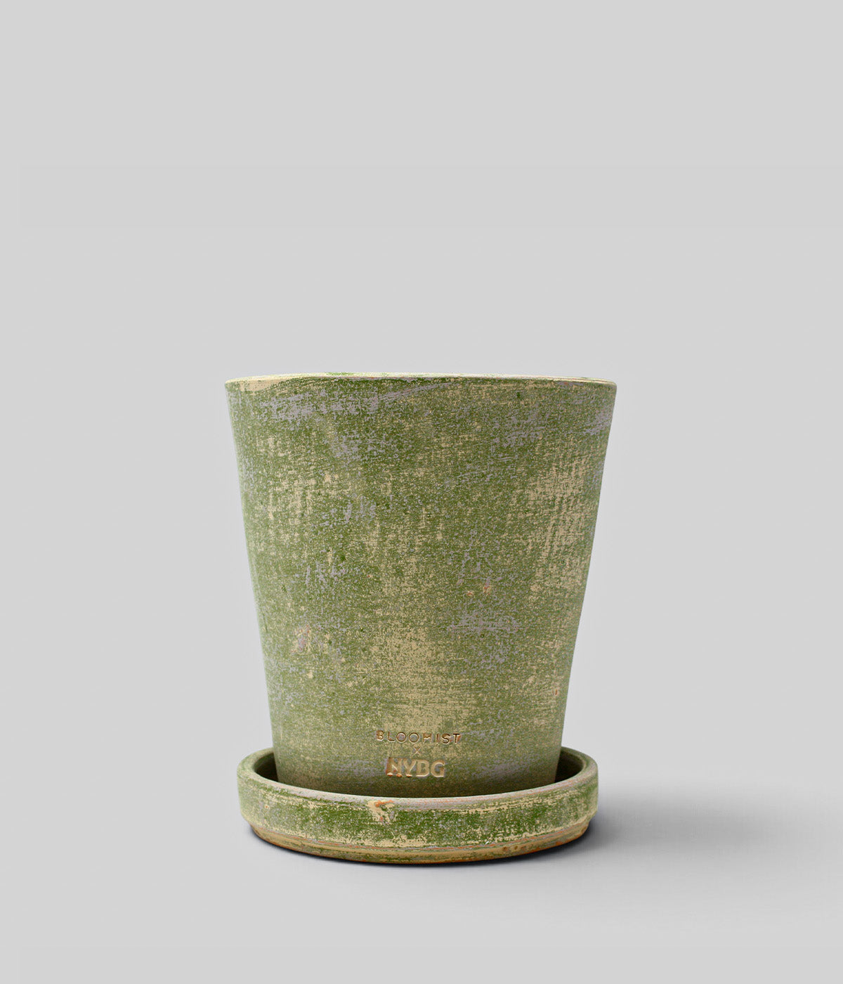 Bloomist x NYBG Garden Sage terra cotta planter with tapered sides, matching tray, and impressed branding near the base