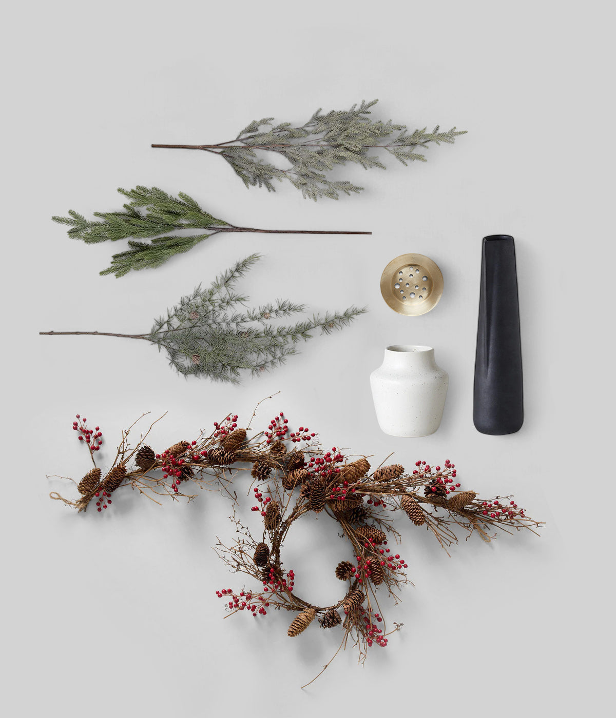 Holiday Fireplace Decor set with brass accents faux pine branches and red berry garlands