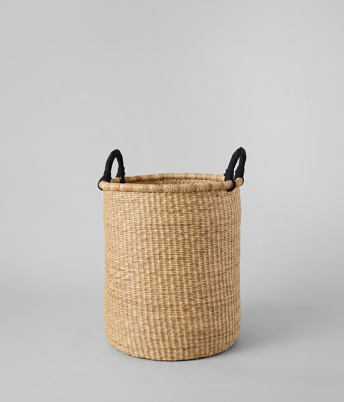 Woven laundry basket made from elephant grass