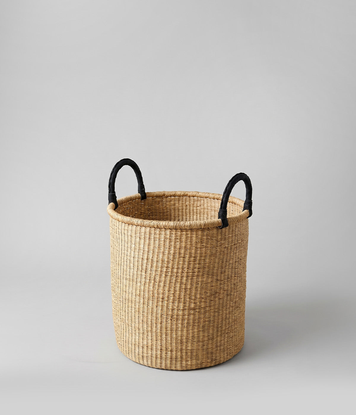 African woven baskets with black leather handles