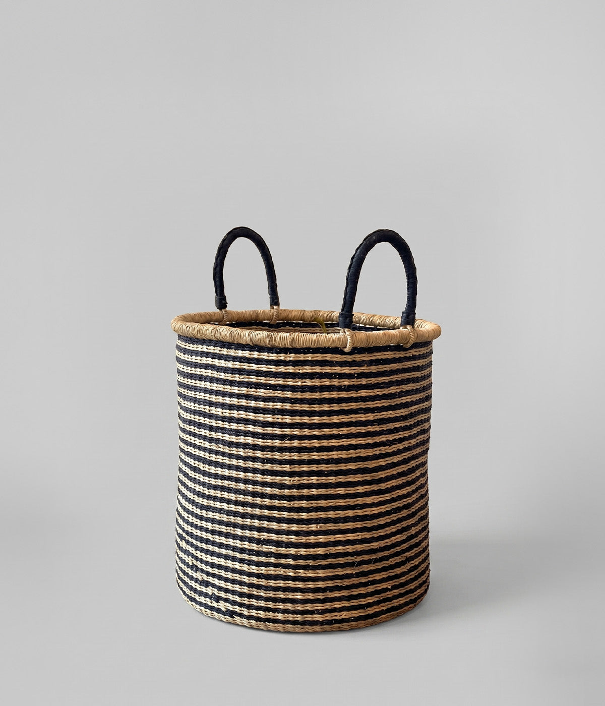 Hamper baskets from Ghana with striped pattern and black leather handles