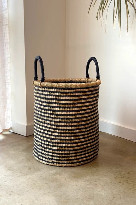 Natural basket with striped weave and leather handles
