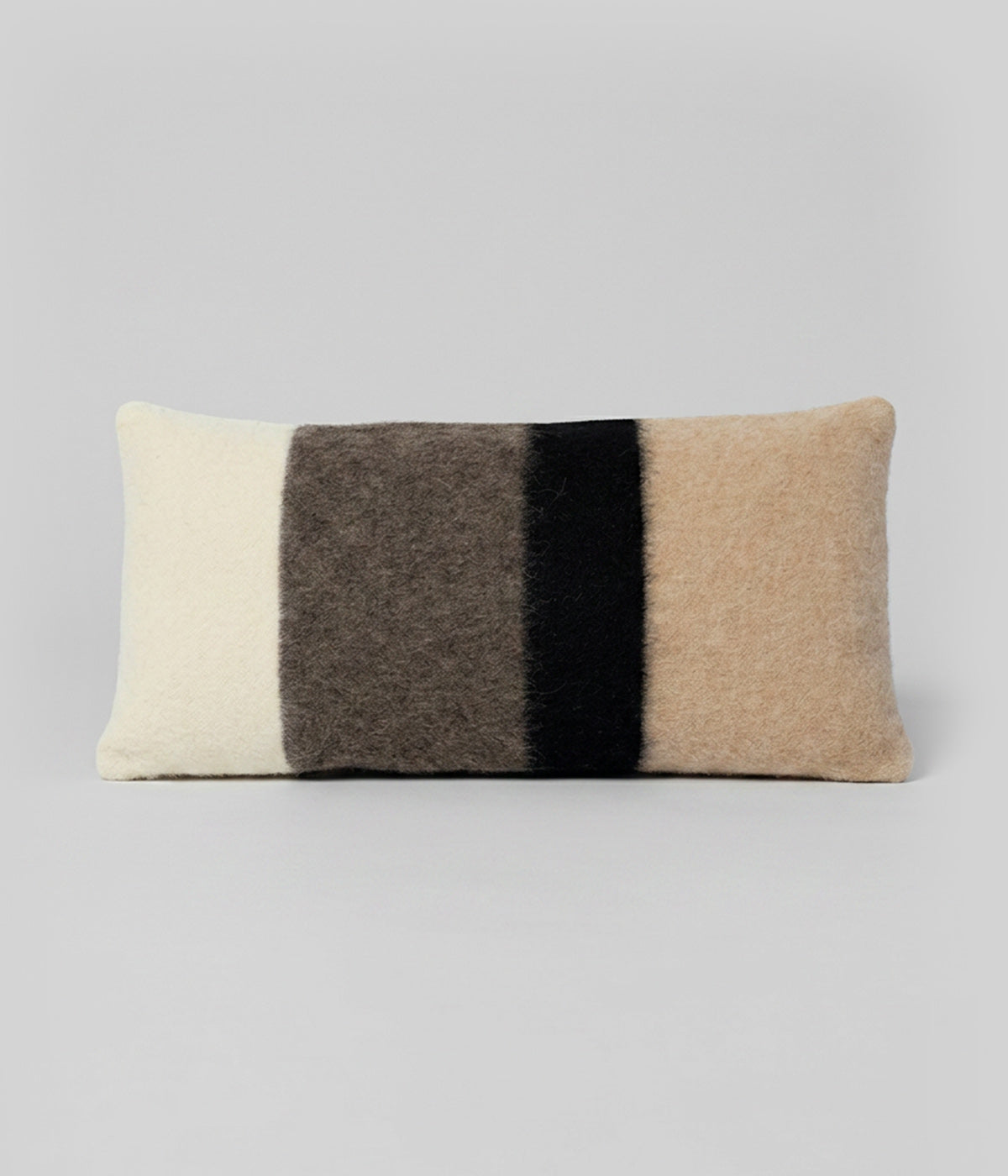 Kimura pillow Earth showing ivory left panel camel right near-black center
