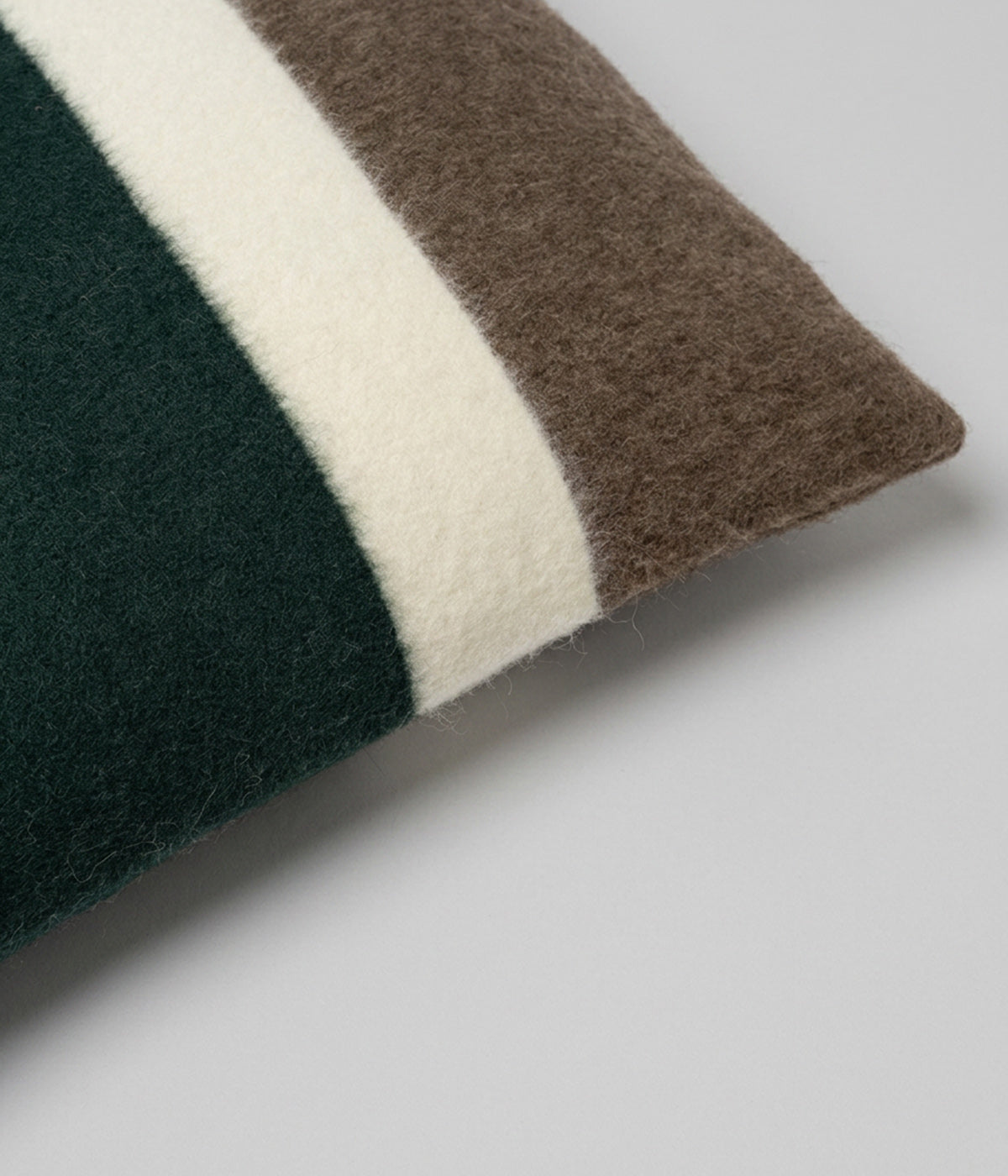Kimura pillow Forest showing forest green yarn only dyed center panel