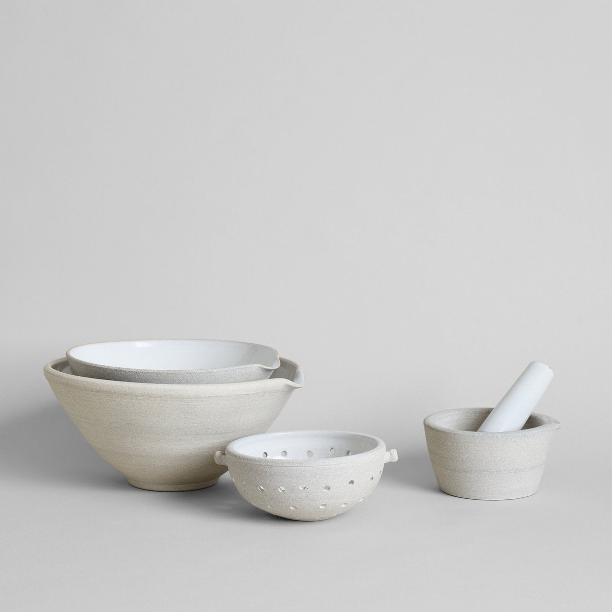 Vermont ceramic kitchen collection with mixing pour bowl, colander, and mortar and pestle