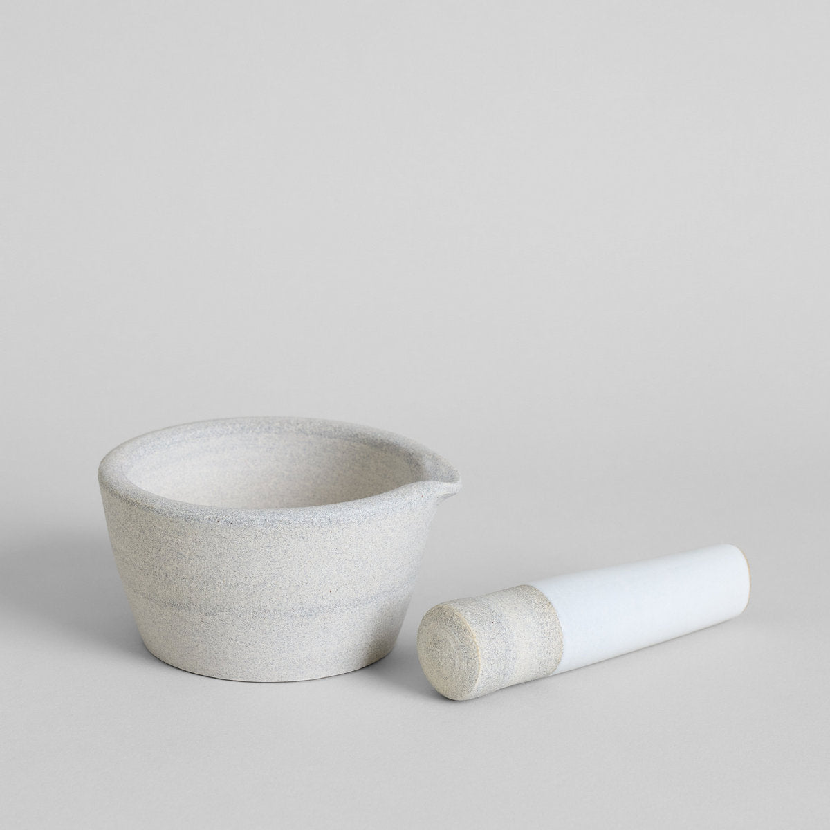 Handcrafted ceramic mortar and pestle for crushing garlic and spices