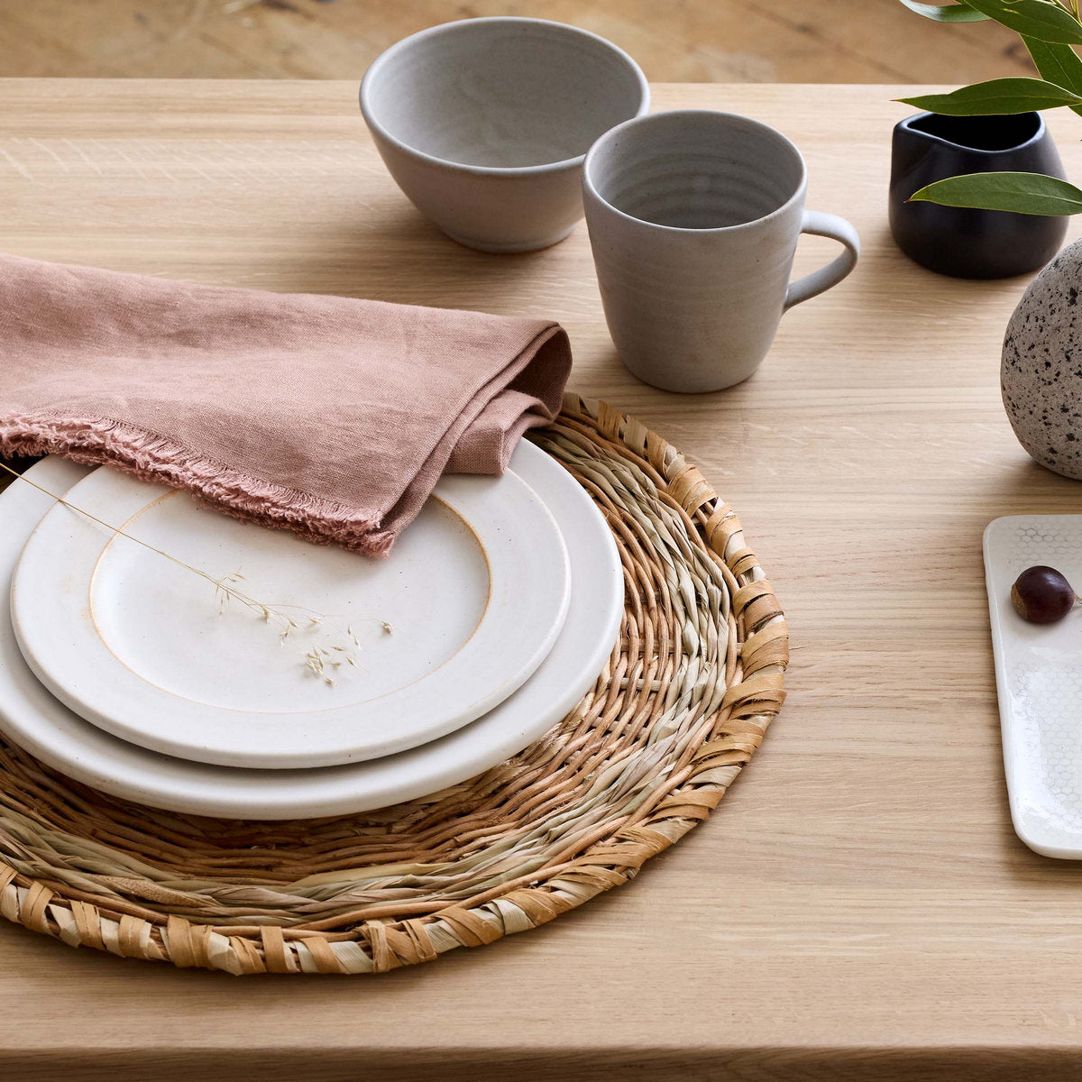 Minimal stoneware mug with balanced weight and tapered shape