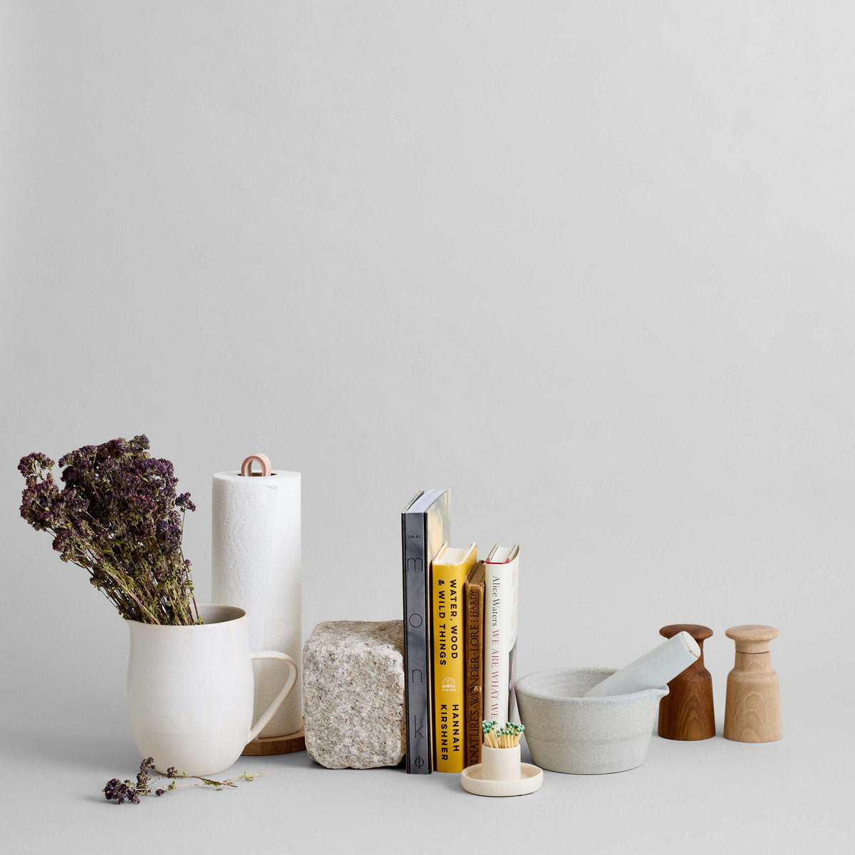 Hand-thrown stoneware mortar and pestle with raw clay texture