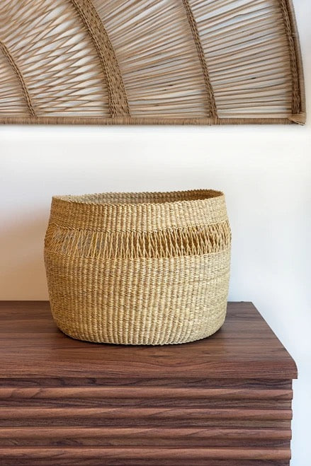 Natural woven basket with open lattice band and dense base