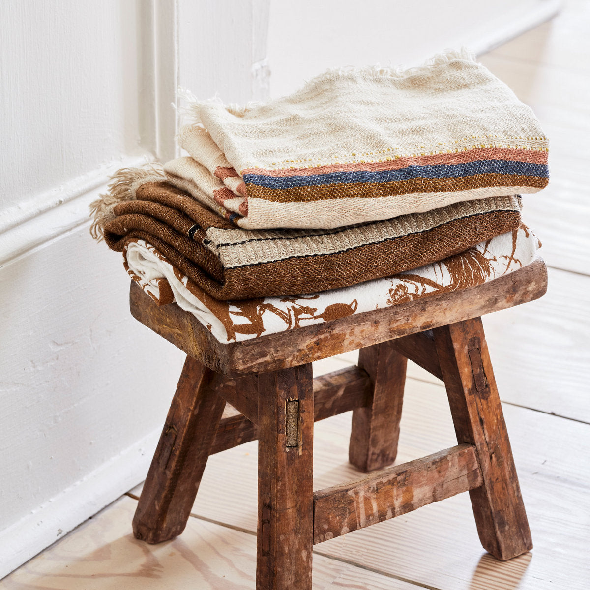 Belgian flax towel with earthy stripes for drying and display