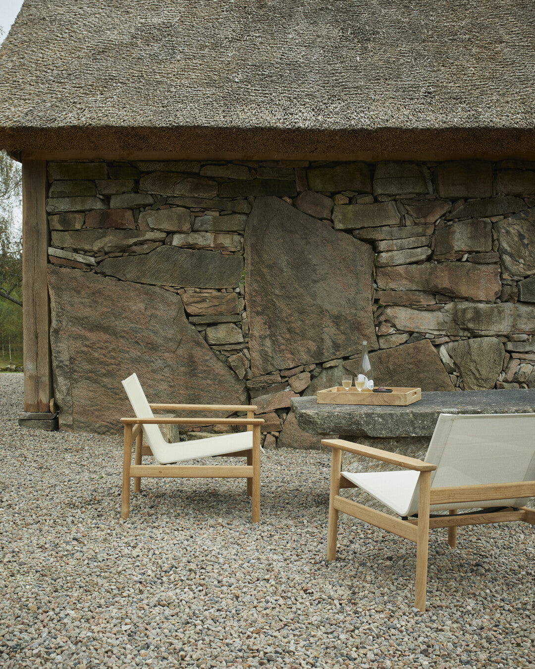 High-end teak poolside lounger
