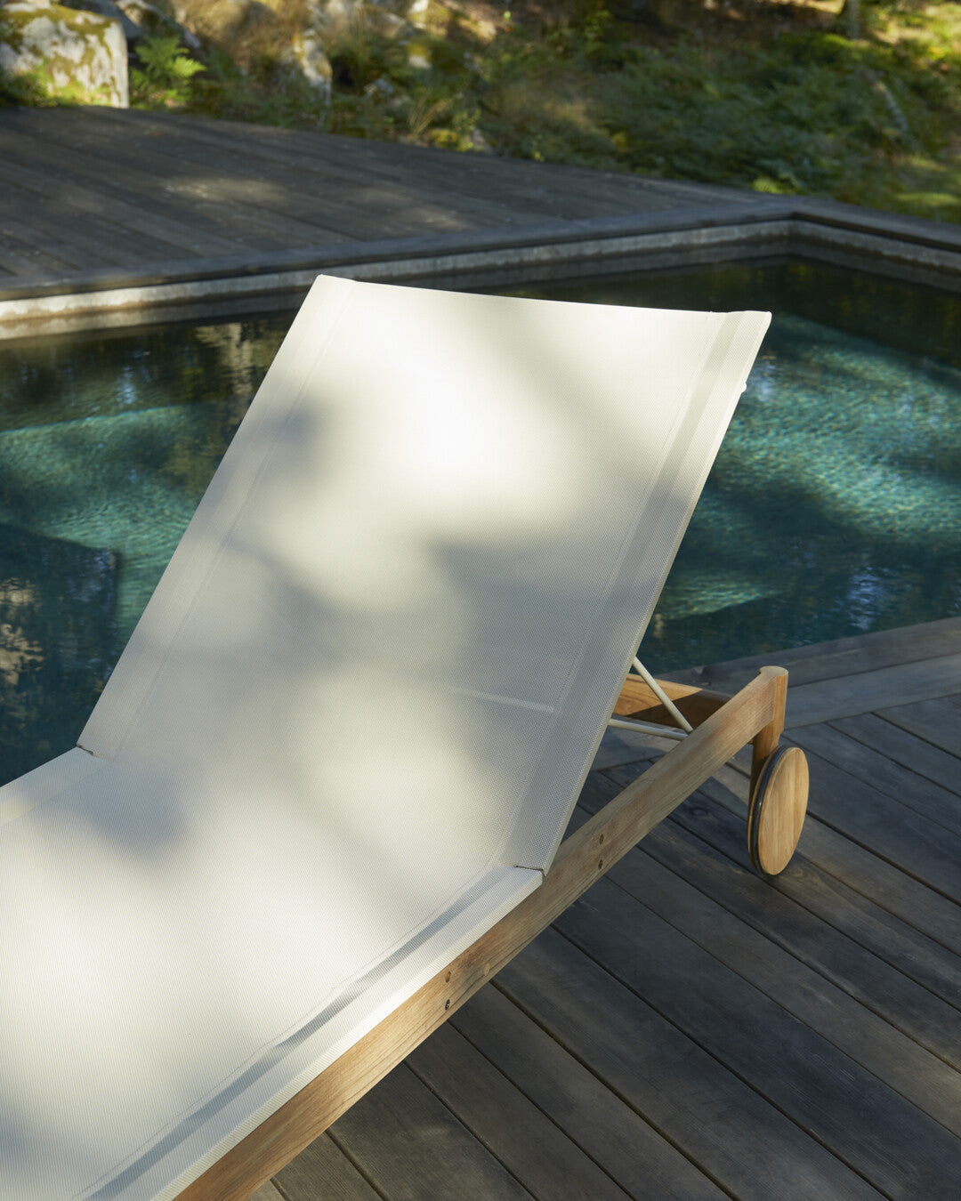 Contemporary teak outdoor sunbed
