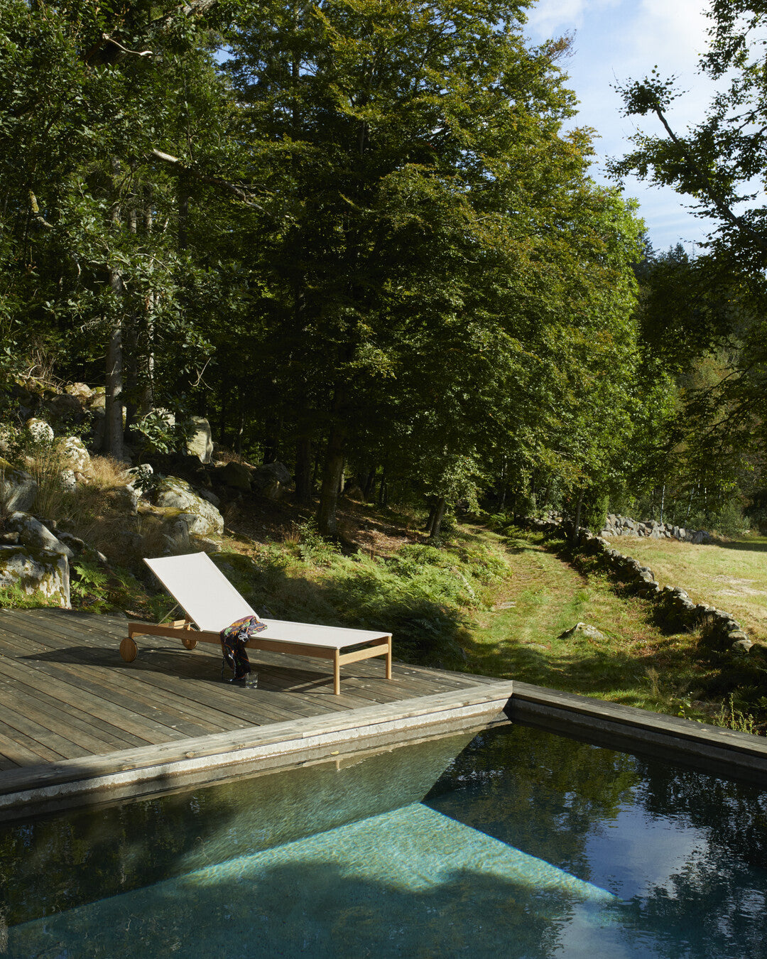 Modern teak deck sunbed
