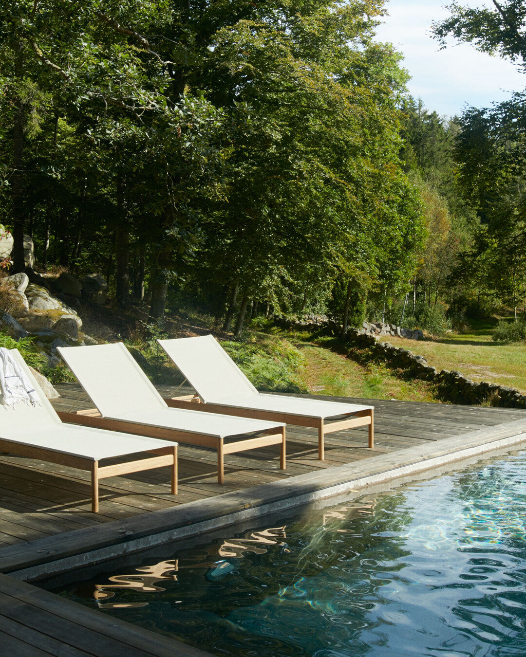 Durable teak garden sun lounger
