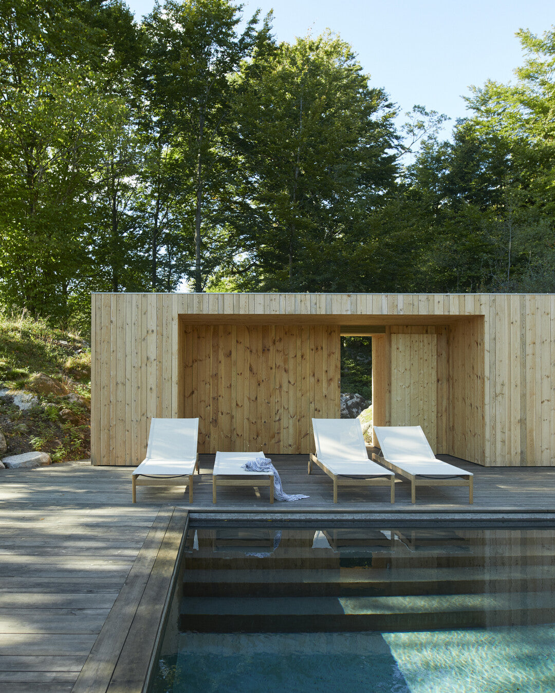 Minimalist teak deck sun lounger
