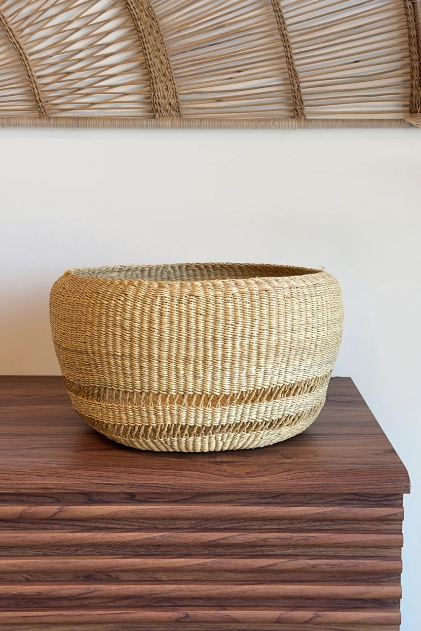 Planter basket with tight weave top and open looped base