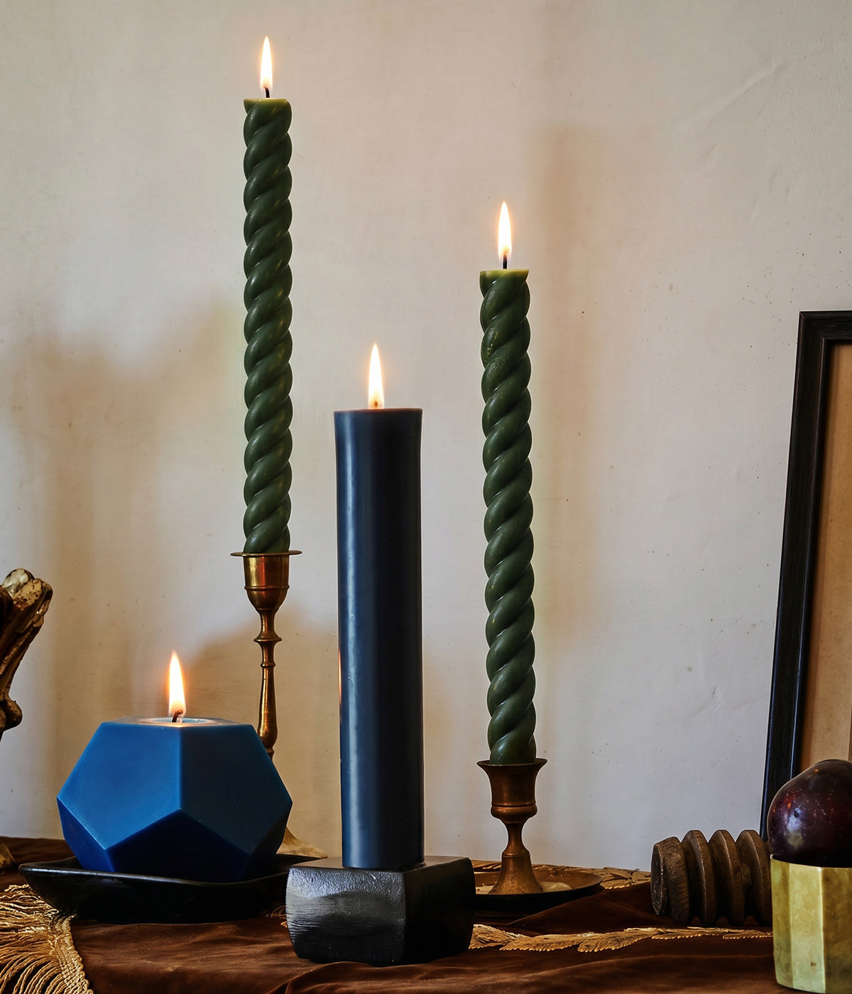 dark green taper candles hand-poured in New York State and sold in pairs.
