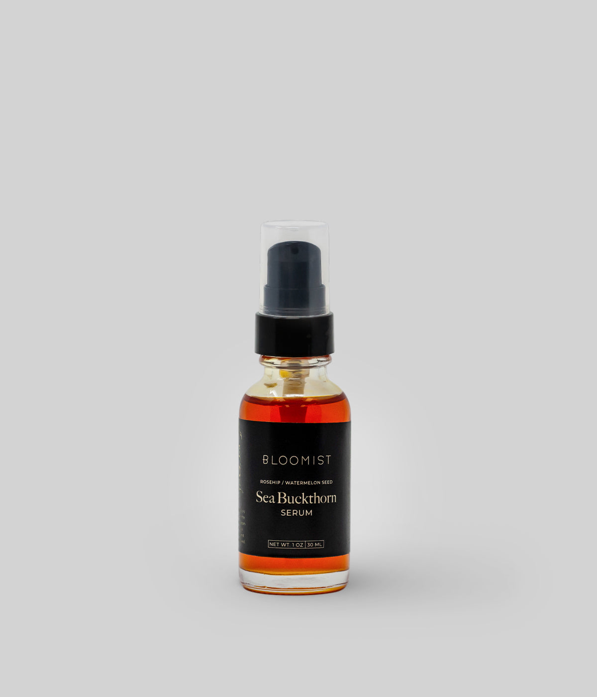 Sea buckthorn serum with omega-7 rich oil in a glass bottle