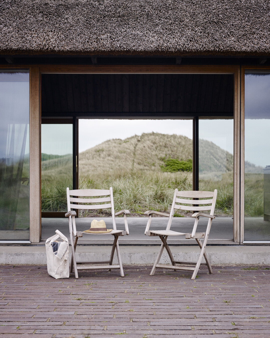 Traditional teak patio chair
