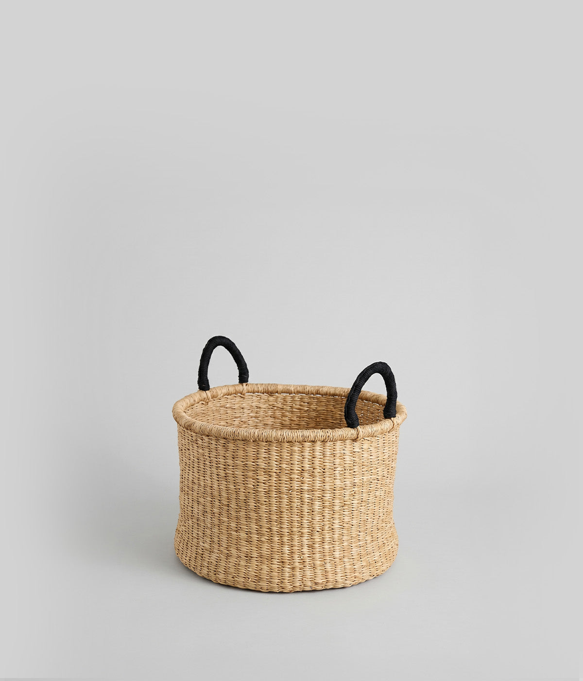 Hand woven African baskets with wide shallow form