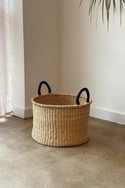 Small laundry basket with open top and leather handles